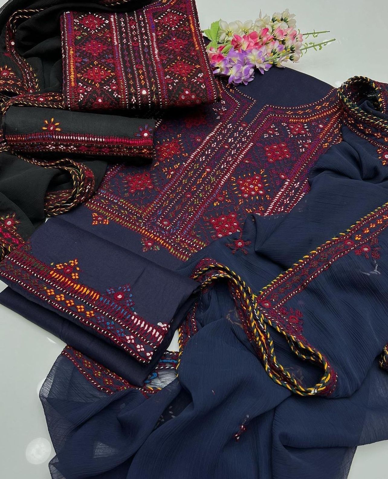 Celebrate this Eid with premium Handcrafted Balochi Collection featuring mirror work and hand embroidery work