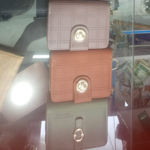 Keep your essentials organized in style with this chic check pattern PU leather wallet  Compact design with secure metal button closure—perfect for everyday elegance